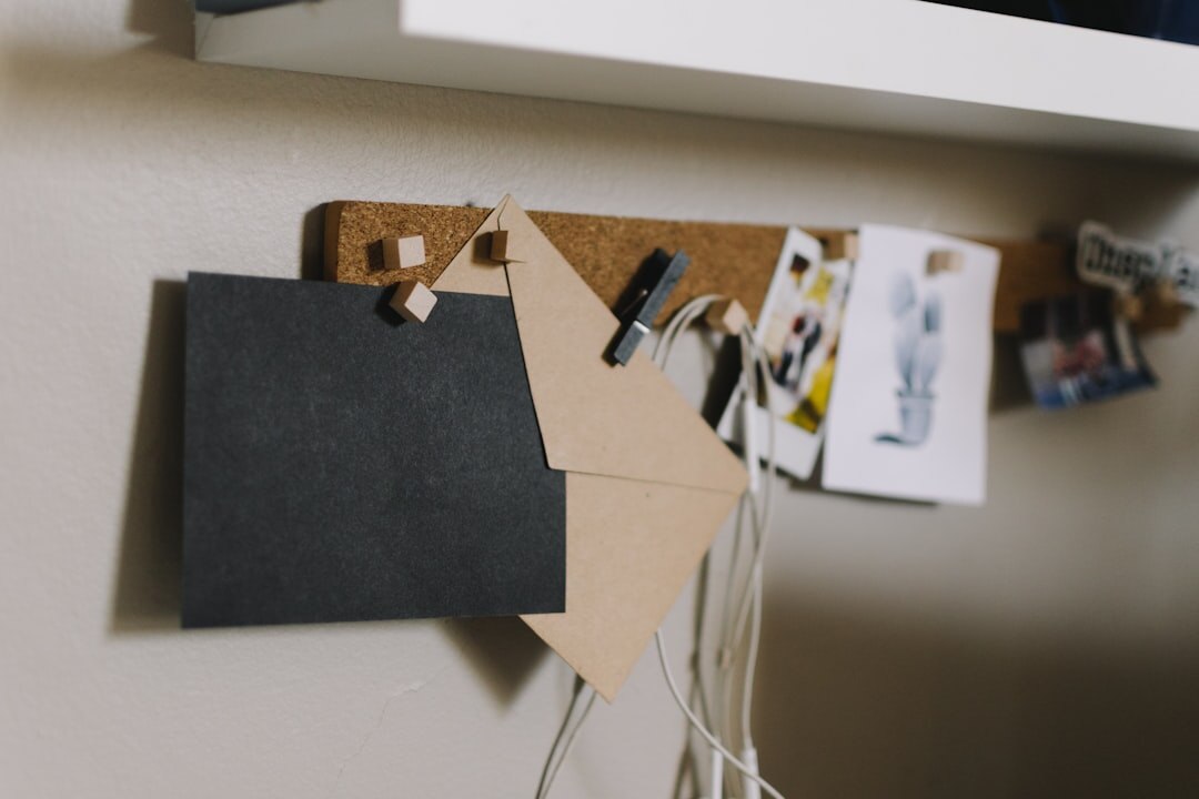 Journalist desk with laptop, notebook, coffee cup and press badge